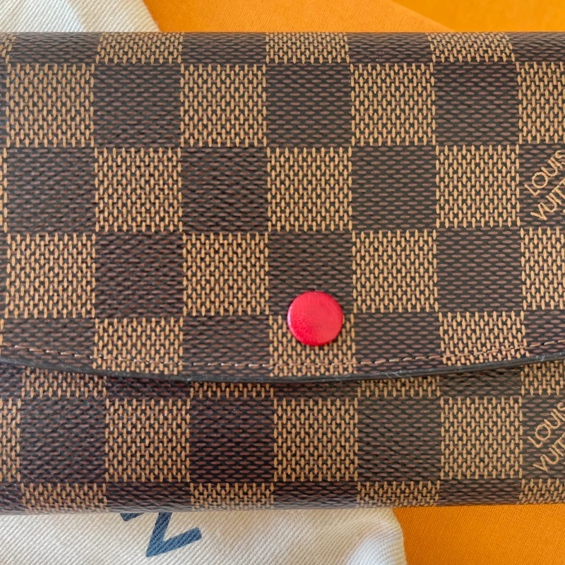 LOUIS VUITTON portefeuille Emilie damier ébène LUXE DE SECONDE MAIN AUTHENTIQUE CERTIFICAT D'AUTHENTICITE ENTRUPY. PORTEFEUILLE DE LUXE D'OCCASION PAS CHER