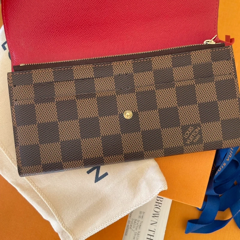 LOUIS VUITTON portefeuille Emilie damier ébène LUXE DE SECONDE MAIN AUTHENTIQUE CERTIFICAT D'AUTHENTICITE ENTRUPY. PORTEFEUILLE DE LUXE D'OCCASION PAS CHER