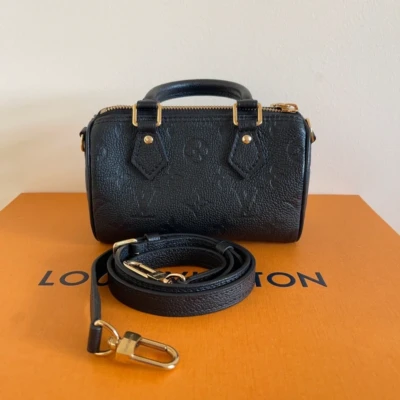 LOUIS VUITTON speedy nano cuir empreinte monogram LUXE DE SECONDE MAIN AUTHENTIQUE CERTIFICAT D'AUTHENTICITE ENTRUPY. SAC DE LUXE D'OCCASION PAS CHER.