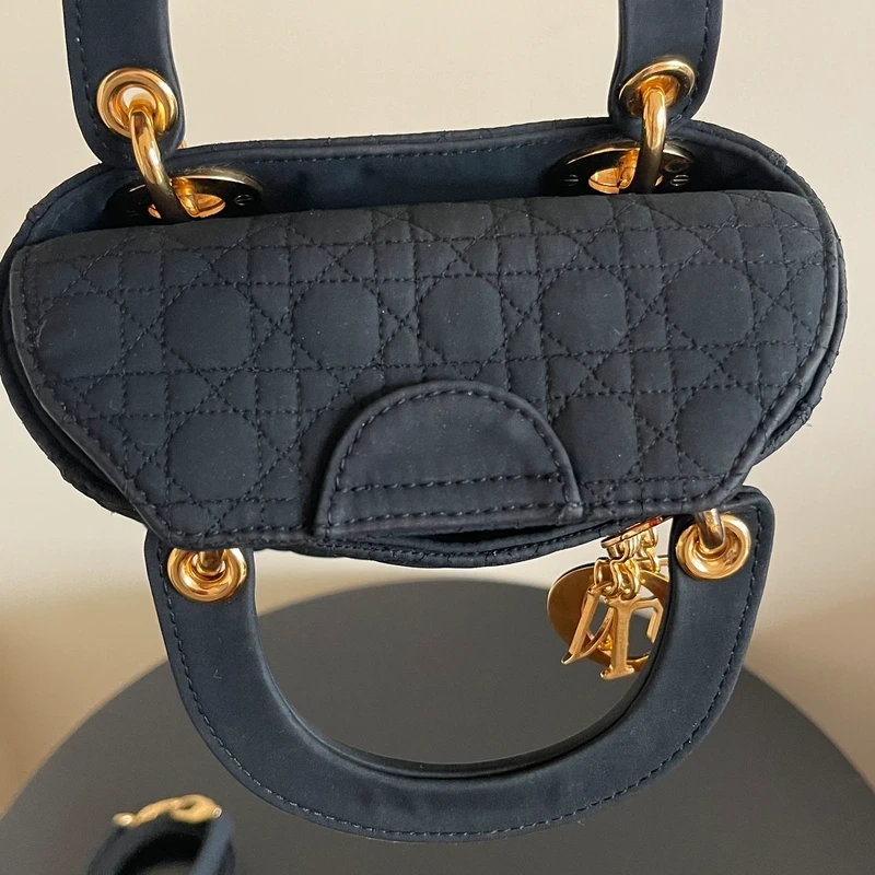 Dior sac Lady dior mini en nylon noir bijouterie dorée LUXE DE SECONDE MAIN AUTHENTIQUE CERTIFICAT D'AUTHENTICITE ENTRUPY. SAC DE LUXE D'OCCASION PAS CHER DIOR FULL SET