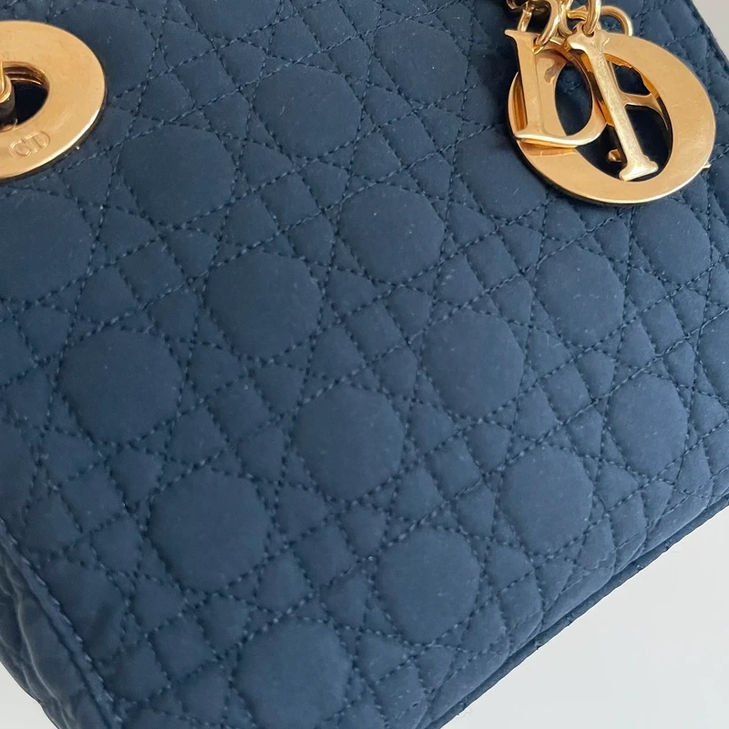 Dior sac Lady dior mini en nylon noir bijouterie dorée LUXE DE SECONDE MAIN AUTHENTIQUE CERTIFICAT D'AUTHENTICITE ENTRUPY. SAC DE LUXE D'OCCASION PAS CHER DIOR FULL SET
