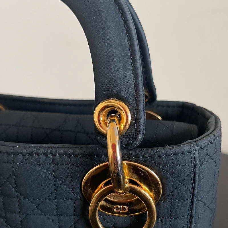 Dior sac Lady dior mini en nylon noir bijouterie dorée LUXE DE SECONDE MAIN AUTHENTIQUE CERTIFICAT D'AUTHENTICITE ENTRUPY. SAC DE LUXE D'OCCASION PAS CHER DIOR FULL SET