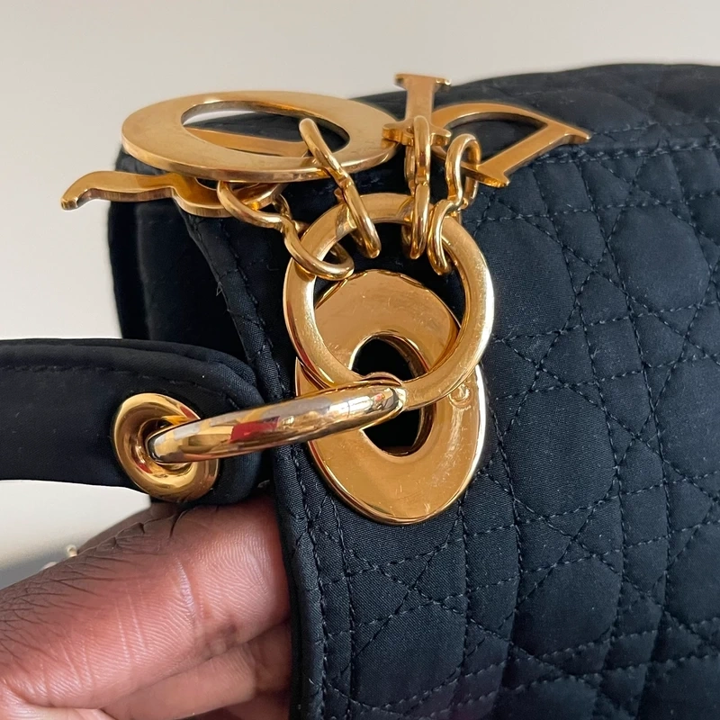 Dior sac Lady dior mini en nylon noir bijouterie dorée LUXE DE SECONDE MAIN AUTHENTIQUE CERTIFICAT D'AUTHENTICITE ENTRUPY. SAC DE LUXE D'OCCASION PAS CHER DIOR FULL SET