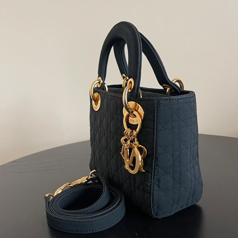 Dior sac Lady dior mini en nylon noir bijouterie dorée LUXE DE SECONDE MAIN AUTHENTIQUE CERTIFICAT D'AUTHENTICITE ENTRUPY. SAC DE LUXE D'OCCASION PAS CHER DIOR FULL SET