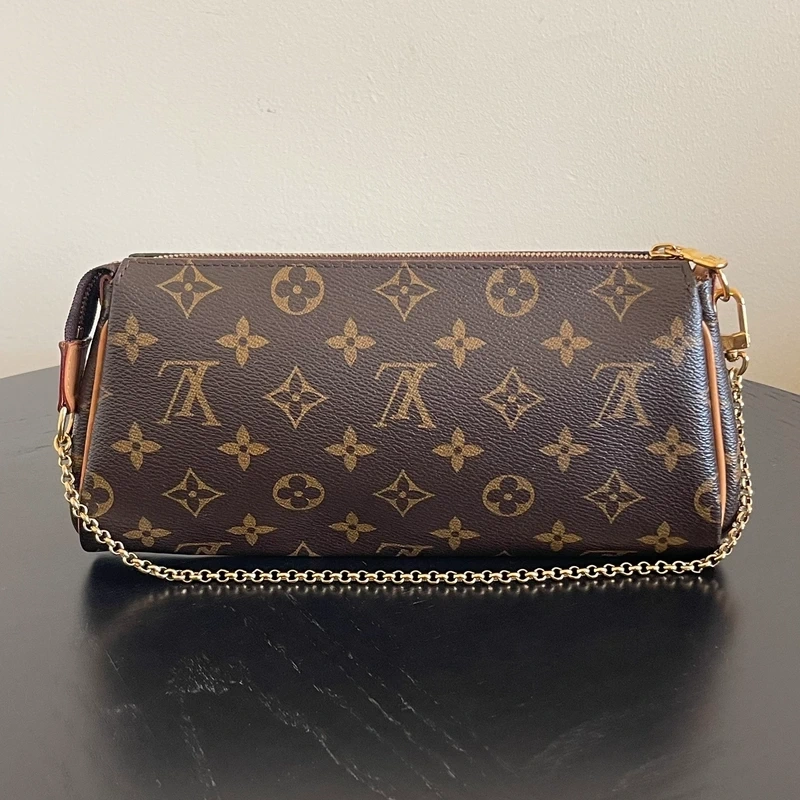 Louis Vuitton Eva monogram LUXE DE SECONDE MAIN AUTHENTIQUE CERTIFICAT D'AUTHENTICITE ENTRUPY. SAC DE LUXE D'OCCASION PAS CHER LOUIS VUITTON FULL SET