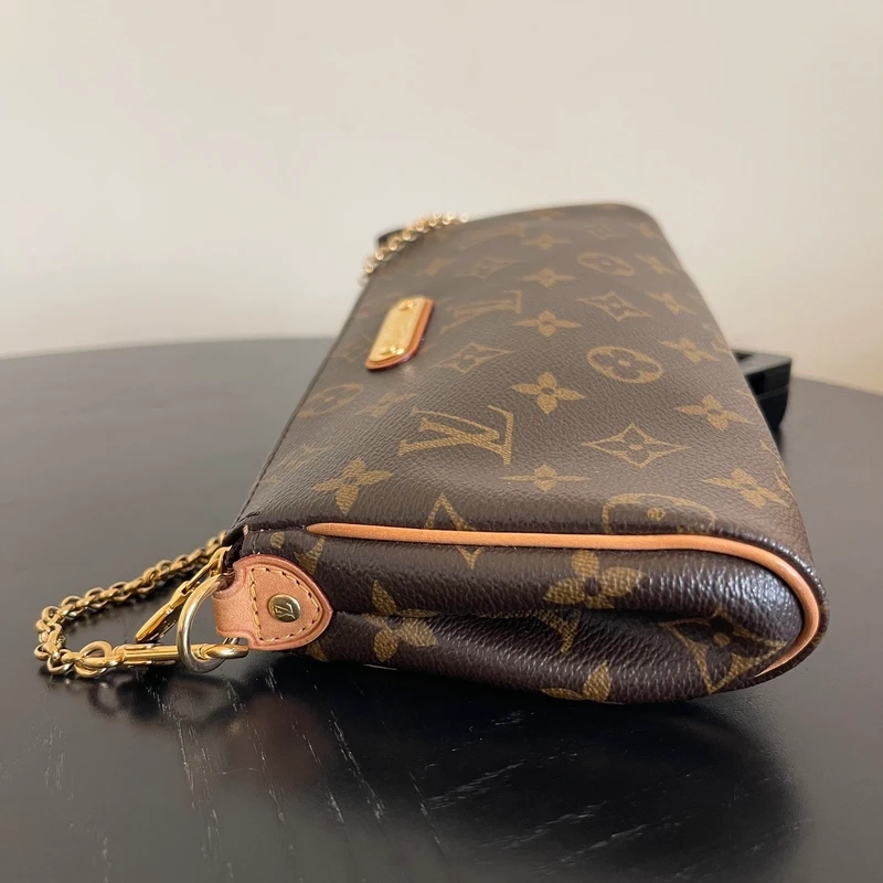 Louis Vuitton Eva monogram LUXE DE SECONDE MAIN AUTHENTIQUE CERTIFICAT D'AUTHENTICITE ENTRUPY. SAC DE LUXE D'OCCASION PAS CHER LOUIS VUITTON FULL SET