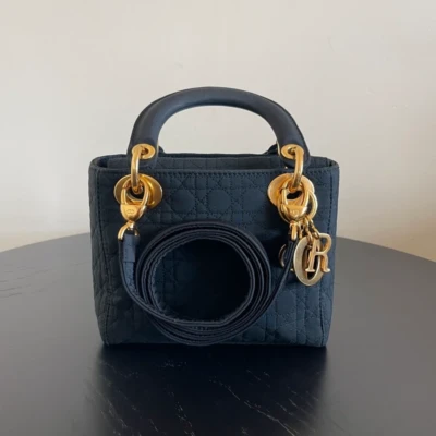Dior sac Lady dior mini en nylon noir bijouterie dorée LUXE DE SECONDE MAIN AUTHENTIQUE CERTIFICAT D'AUTHENTICITE ENTRUPY. SAC DE LUXE D'OCCASION PAS CHER DIOR FULL SET