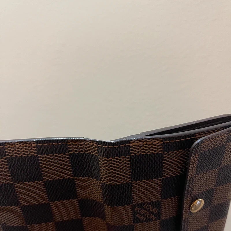 Louis Vuitton petit portefeuille bifold damier ébène LUXE DE SECONDE MAIN AUTHENTIQUE CERTIFICAT D'AUTHENTICITE ENTRUPY. LUXE D'OCCASION PAS CHER.