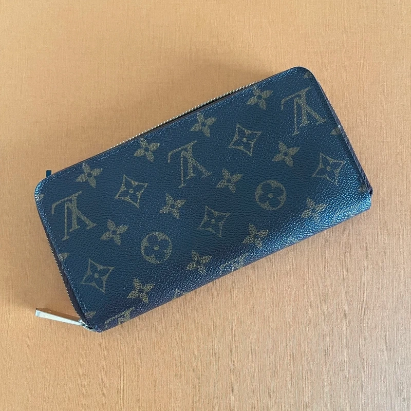 LOUIS VUITTON portefeuille zippy monogram LUXE DE SECONDE MAIN AUTHENTIQUE CERTIFICAT D'AUTHENTICITE ENTRUPY. SAC DE LUXE D'OCCASION PAS CHER LOUIS VUITTON FULL SET.