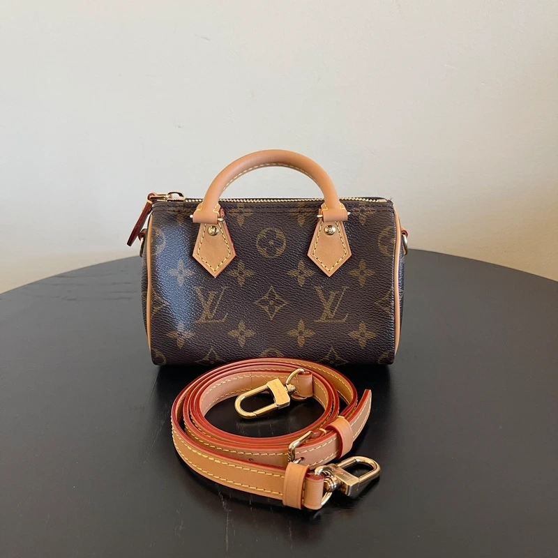 LOUIS VUITTON speedy nano toile monogram LUXE DE SECONDE MAIN AUTHENTIQUE CERTIFICAT D'AUTHENTICITE ENTRUPY. LUXE D'OCCASION PAS CHER. SOULIERS DE LUXE