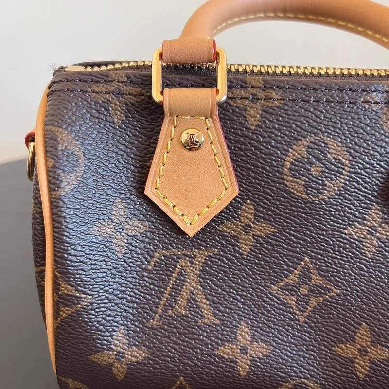 LOUIS VUITTON speedy nano toile monogram LUXE DE SECONDE MAIN AUTHENTIQUE CERTIFICAT D'AUTHENTICITE ENTRUPY. LUXE D'OCCASION PAS CHER. SOULIERS DE LUXE