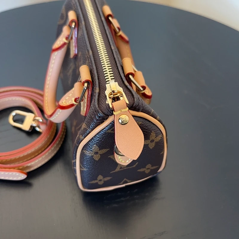 LOUIS VUITTON speedy nano toile monogram LUXE DE SECONDE MAIN AUTHENTIQUE CERTIFICAT D'AUTHENTICITE ENTRUPY. LUXE D'OCCASION PAS CHER. SOULIERS DE LUXE
