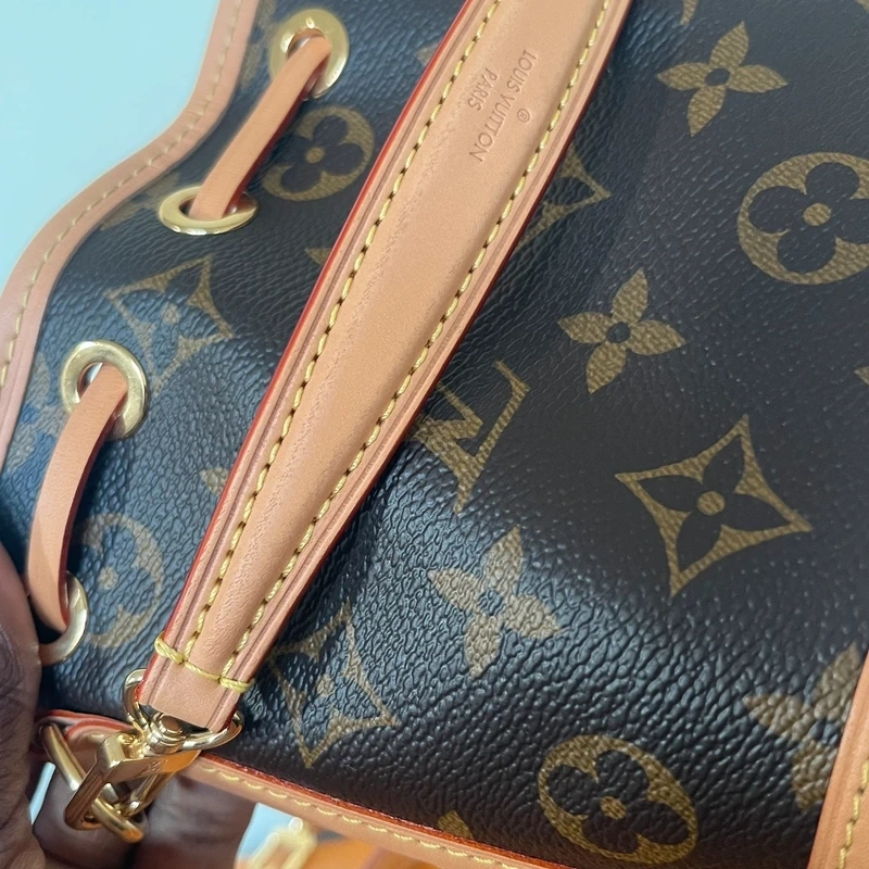 LOUIS VUITTON nano noé monogram LUXE DE SECONDE MAIN AUTHENTIQUE CERTIFICAT D'AUTHENTICITE ENTRUPY. SAC DE LUXE D'OCCASION PAS CHER LOUIS VUITTON FULL SET.
