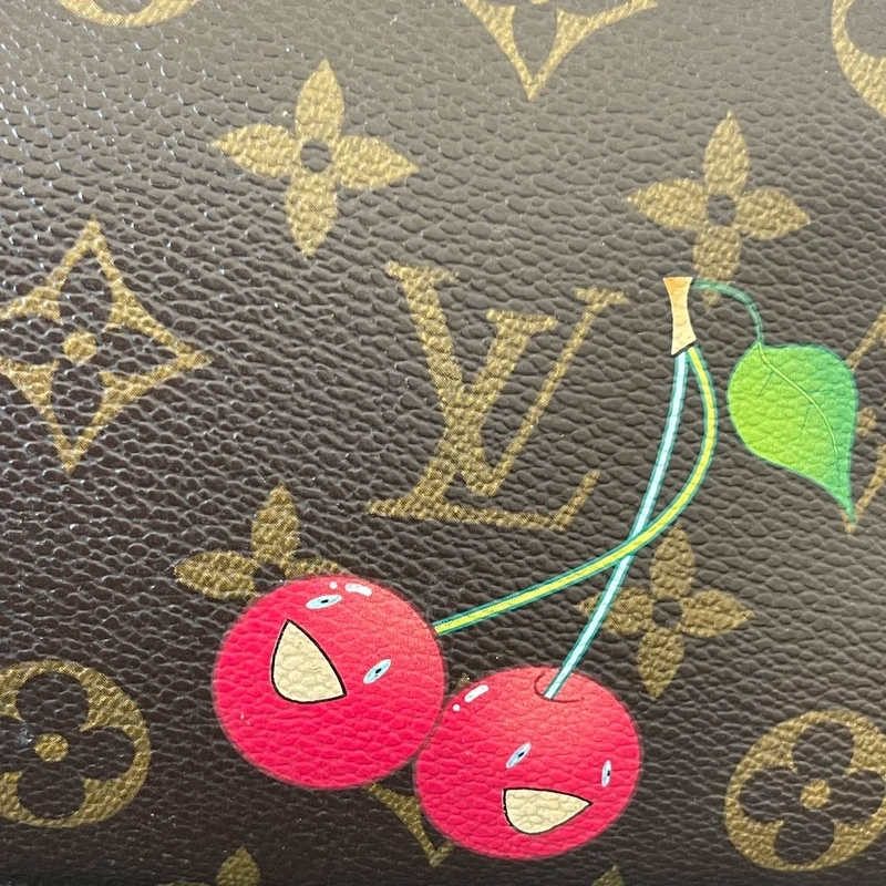 Louis Vuitton pochette accessoires cerise Takashi Murakami LUXE DE SECONDE MAIN AUTHENTIQUE CERTIFICAT D'AUTHENTICITE ENTRUPY. LUXE D'OCCASION PAS CHER.