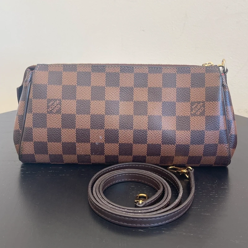 LOUIS VUITTON Pochette Eva Damier Ebène LUXE DE SECONDE MAIN AUTHENTIQUE. SAC D'OCCASION PAS CHER CERTIFICAT D'AUTHENTICITE ENTRUPY. LOUIS VUITTON FULL SET