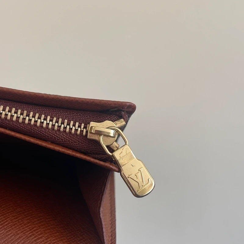 LOUIS VUITTON portefeuille bifold monogram LUXE DE SECONDE MAIN AUTHENTIQUE CERTIFICAT D'AUTHENTICITE ENTRUPY. SAC DE LUXE D'OCCASION PAS CHER LOUIS VUITTON FULL SET.