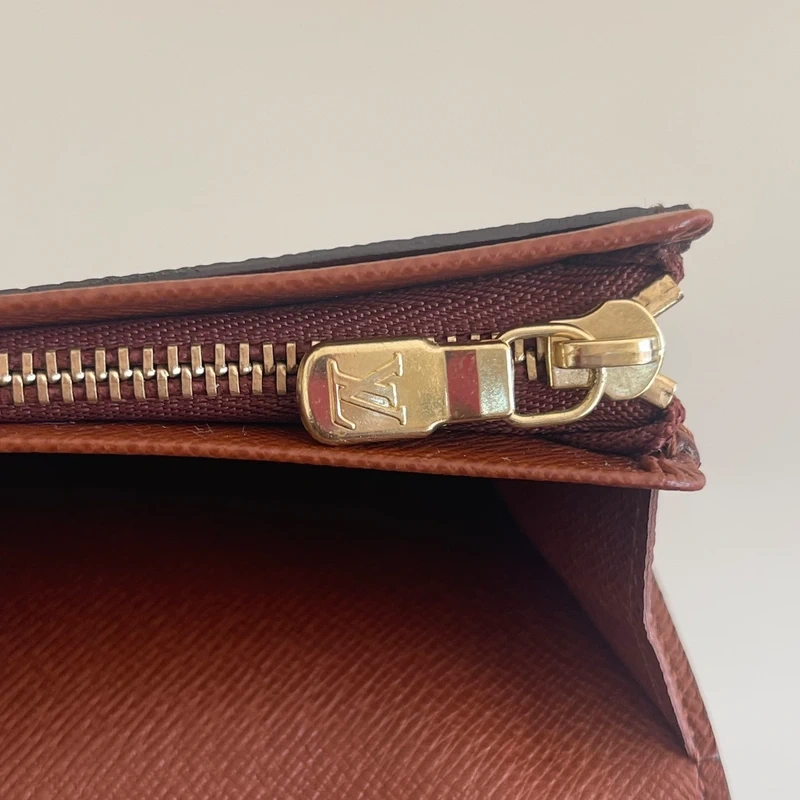 LOUIS VUITTON portefeuille bifold monogram LUXE DE SECONDE MAIN AUTHENTIQUE CERTIFICAT D'AUTHENTICITE ENTRUPY. SAC DE LUXE D'OCCASION PAS CHER LOUIS VUITTON FULL SET.