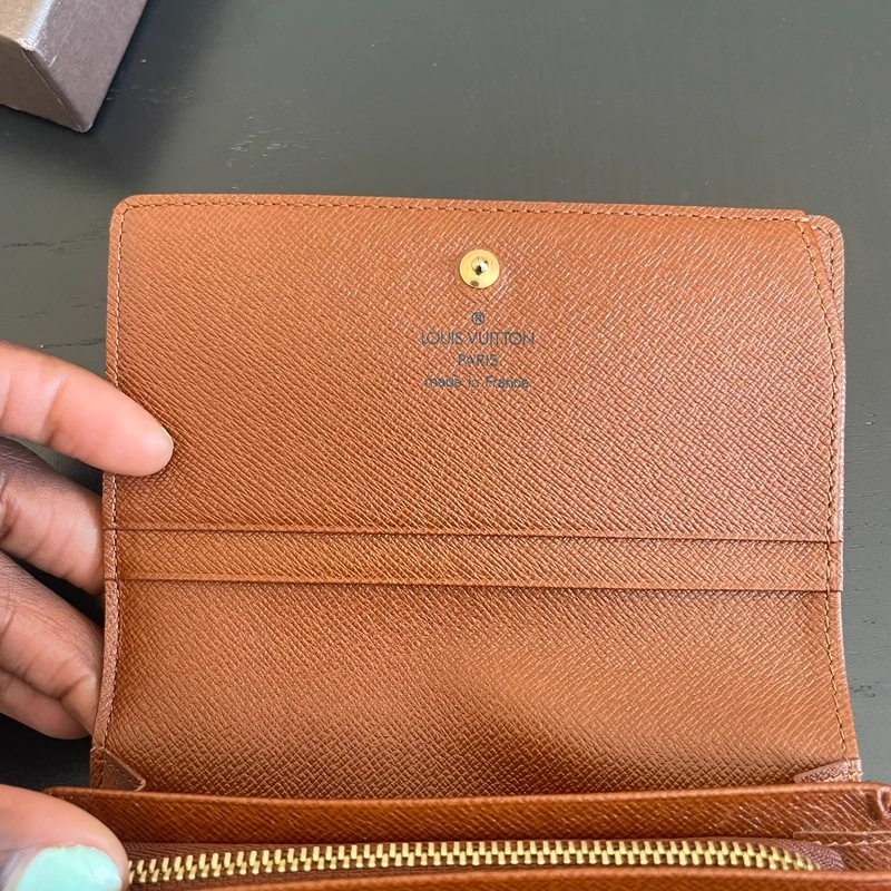 LOUIS VUITTON portefeuille bifold monogram LUXE DE SECONDE MAIN AUTHENTIQUE CERTIFICAT D'AUTHENTICITE ENTRUPY. SAC DE LUXE D'OCCASION PAS CHER LOUIS VUITTON FULL SET.