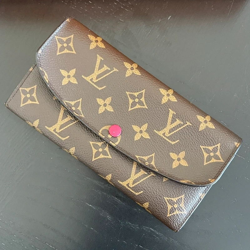 Louis Vuitton portefeuille Emilie monogram LUXE DE SECONDE MAIN AUTHENTIQUE CERTIFICAT D'AUTHENTICITE ENTRUPY. SAC DE LUXE D'OCCASION PAS CHER. LOUIS VUITTON FULL SET