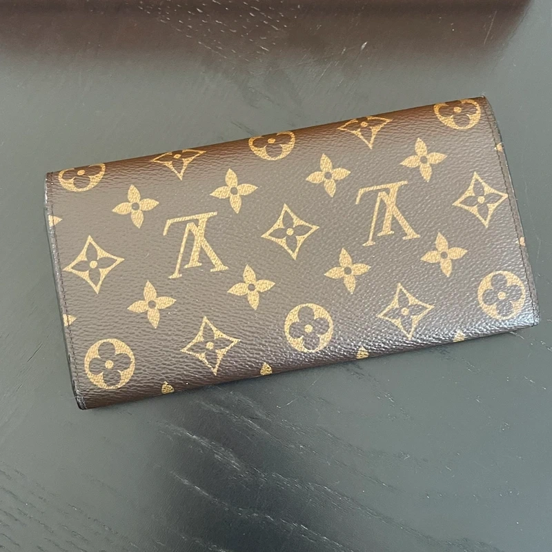 Louis Vuitton portefeuille Emilie monogram LUXE DE SECONDE MAIN AUTHENTIQUE CERTIFICAT D'AUTHENTICITE ENTRUPY. SAC DE LUXE D'OCCASION PAS CHER. LOUIS VUITTON FULL SET