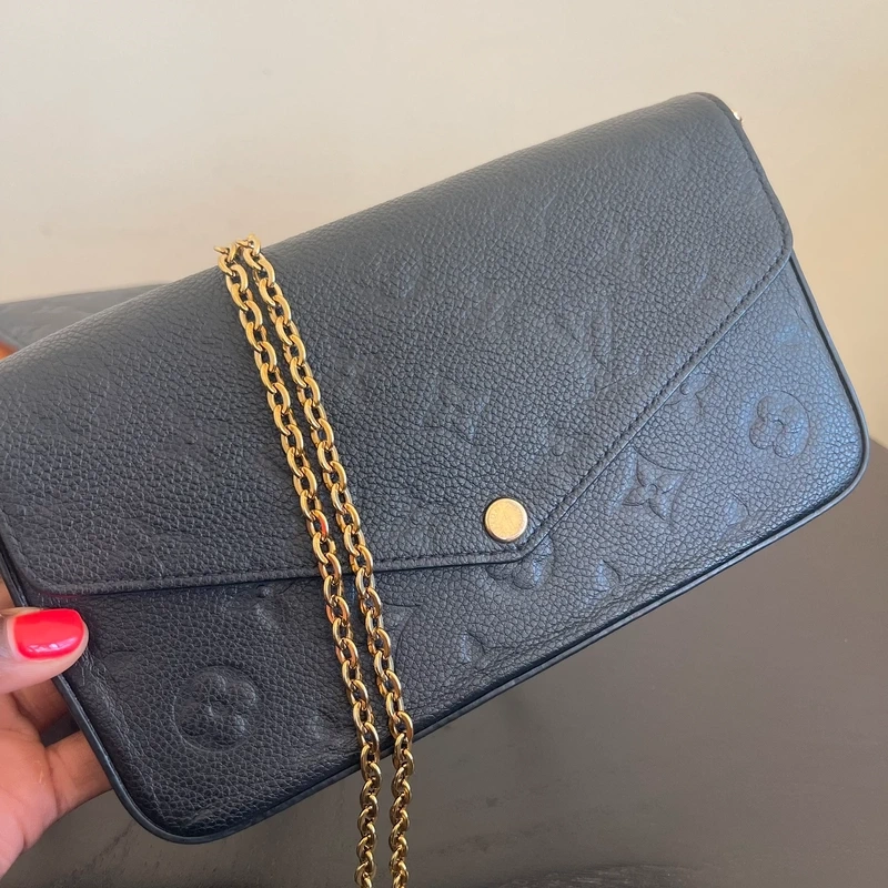 LOUIS VUITTON Félicie en cuir monogram empreinte noir SAC DE LUXE DE SECONDE MAIN AUTHENTIQUE CERTIFICAT D'AUTHENTICITE ENTRUPY. SAC DE LUXE D'OCCASION PAS CHER LV FULL SET.