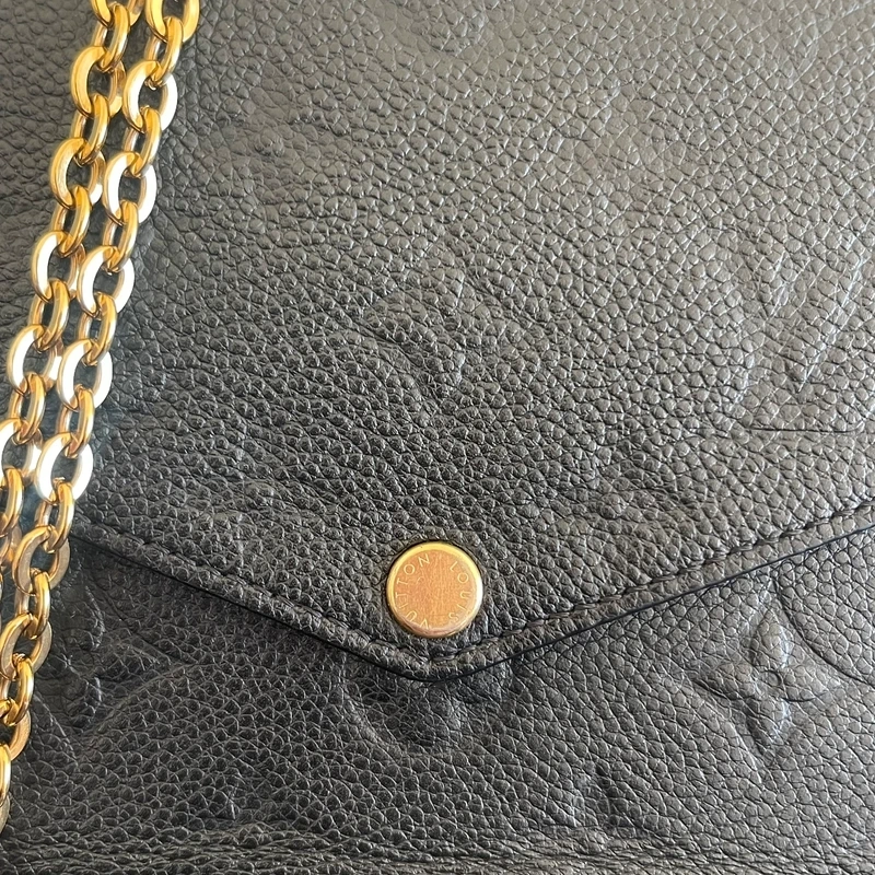 LOUIS VUITTON Félicie en cuir monogram empreinte noir SAC DE LUXE DE SECONDE MAIN AUTHENTIQUE CERTIFICAT D'AUTHENTICITE ENTRUPY. SAC DE LUXE D'OCCASION PAS CHER LV FULL SET.