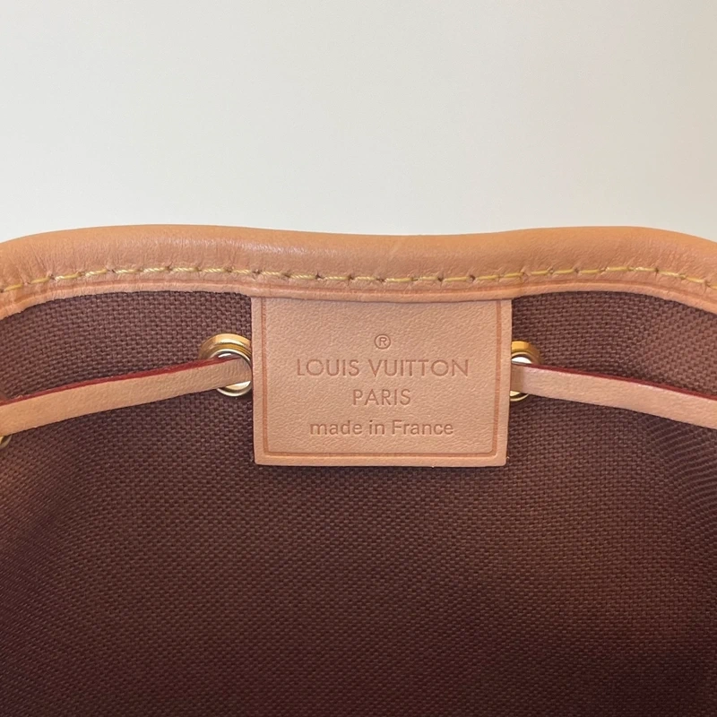 LOUIS VUITTON Noé nano monogram SAC DE LUXE DE SECONDE MAIN AUTHENTIQUE CERTIFICAT D'AUTHENTICITE ENTRUPY. SAC DE LUXE D'OCCASION PAS CHER. LOUIS VUITTON FULL SET