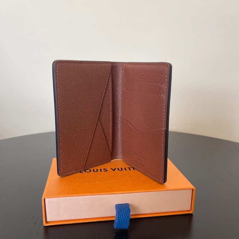 LOUIS VUITTON organizer de poche monogram LUXE DE SECONDE MAIN AUTHENTIQUE CERTIFICAT D'AUTHENTICITE ENTRUPY. SAC DE LUXE D'OCCASION PAS CHER. PETITE MAROQUINERIE LV