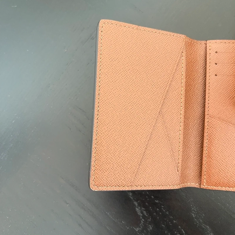 LOUIS VUITTON organizer de poche monogram LUXE DE SECONDE MAIN AUTHENTIQUE CERTIFICAT D'AUTHENTICITE ENTRUPY. SAC DE LUXE D'OCCASION PAS CHER. PETITE MAROQUINERIE LV