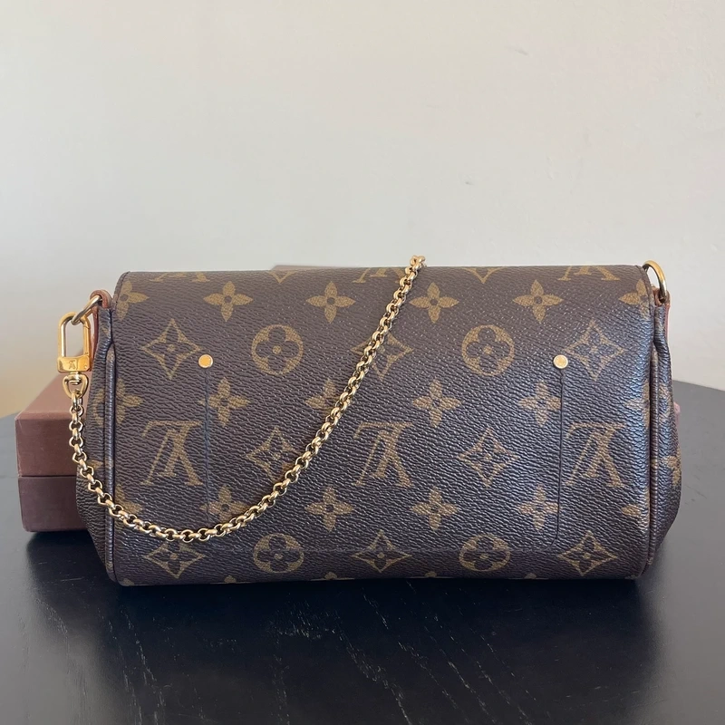 LOUIS VUITTON pochette favorite PM en toile en toile monogram SAC DE LUXE DE SECONDE MAIN AUTHENTIQUE. CERTIFICAT ENTRUPY