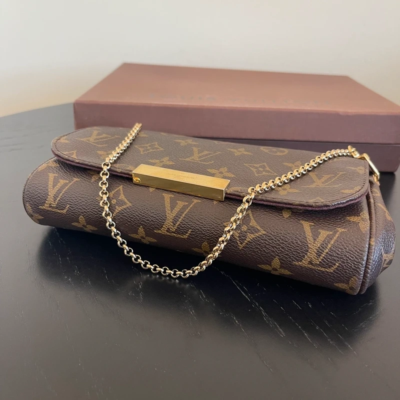 LOUIS VUITTON pochette favorite PM en toile en toile monogram SAC DE LUXE DE SECONDE MAIN AUTHENTIQUE. CERTIFICAT ENTRUPY