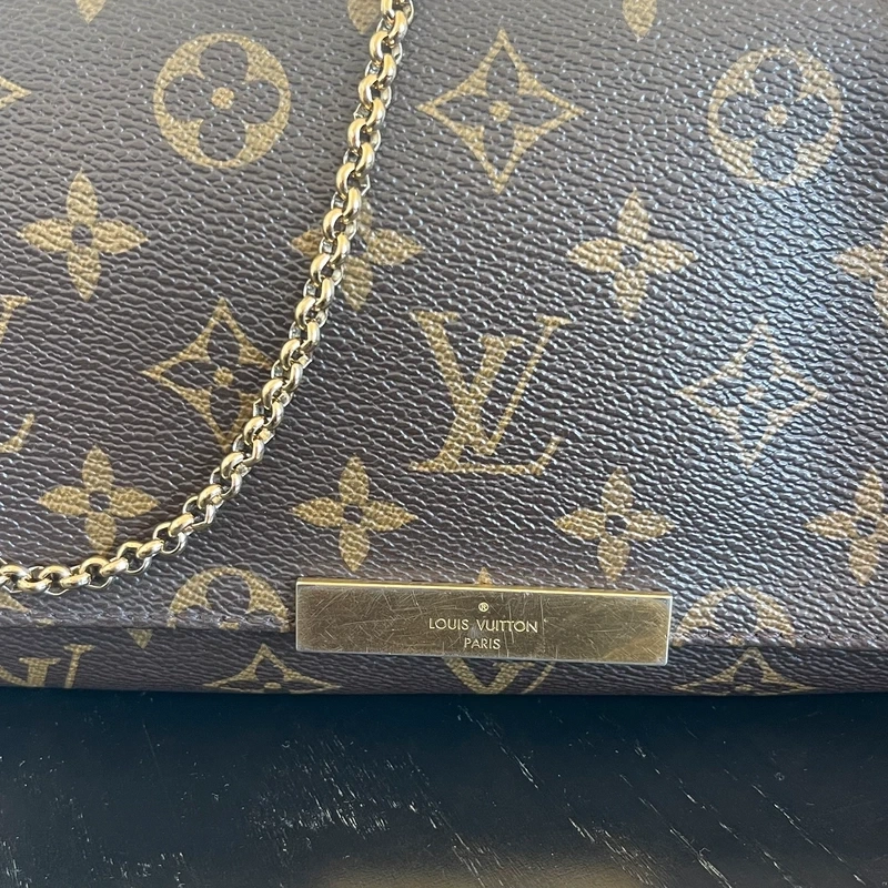 LOUIS VUITTON pochette favorite PM en toile en toile monogram SAC DE LUXE DE SECONDE MAIN AUTHENTIQUE. CERTIFICAT ENTRUPY