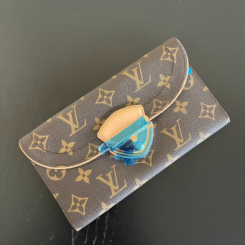 Louis Vuitton portefeuille Eugenie monogram LUXE DE SECONDE MAIN AUTHENTIQUE. SAC DE LUXE LV ENTRUPY CERTIFICATE