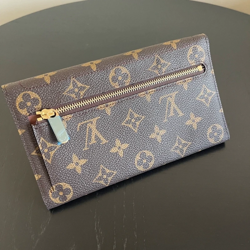 Louis Vuitton portefeuille Eugenie monogram LUXE DE SECONDE MAIN AUTHENTIQUE. SAC DE LUXE LV ENTRUPY CERTIFICATE