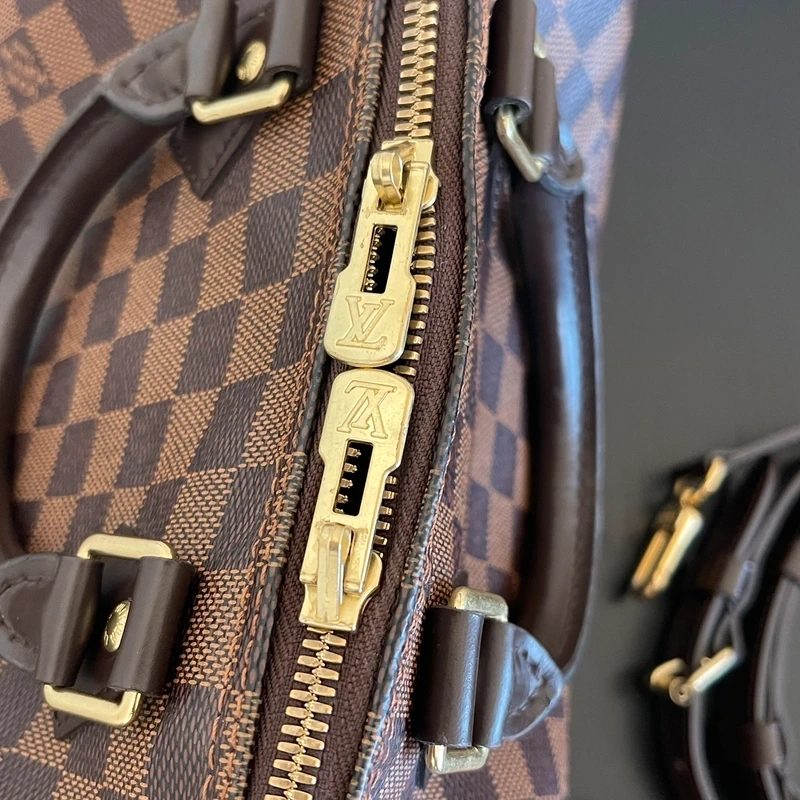 Louis Vuitton speedy 25 bandoulière damier ébène LUXE DE SECONDE MAIN AUTHENTIQUE. SAC DE LUXE LV ENTRUPY CERTIFICATE