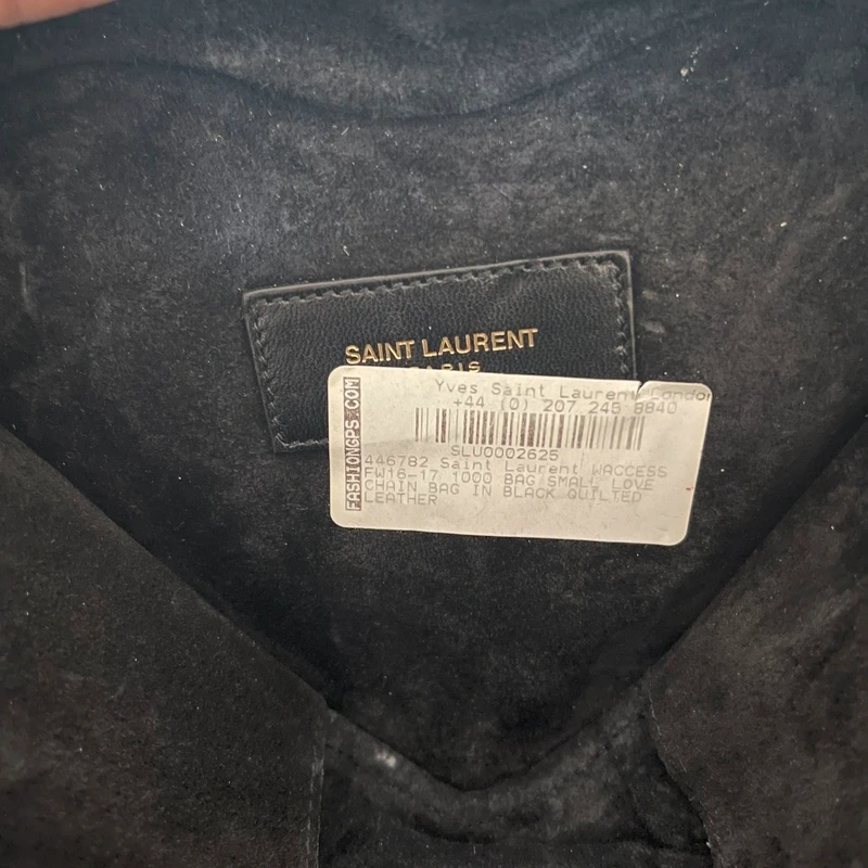 Yves Saint Laurent sac love en cuir noir et dorée LUXE DE SECONDE MAIN AUTHENTIQUE CERTIFICAT D'AUTHENTICITE ENTRUPY. SAC DE LUXE D'OCCASION PAS CHER LOUIS VUITTON FULL SET.