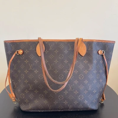 Louis Vuitton neverfull MM monogram SAC DE LUXE LV. LUXE DE SECONDE MAIN AUTHENTIQUE. ENTRUPY CERTIFICATE