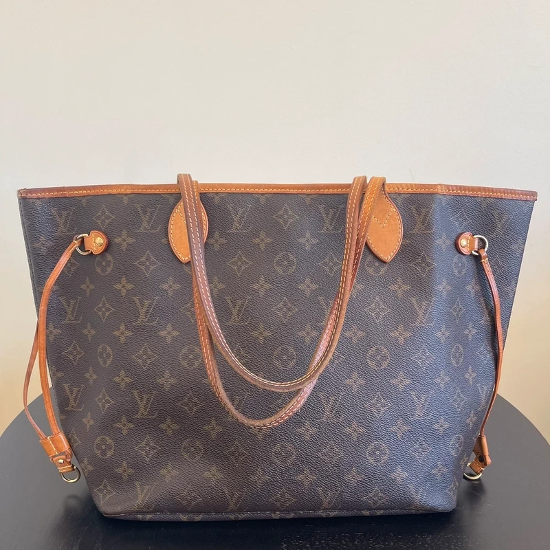Louis Vuitton neverfull MM monogram SAC DE LUXE LV. LUXE DE SECONDE MAIN AUTHENTIQUE. ENTRUPY CERTIFICATE