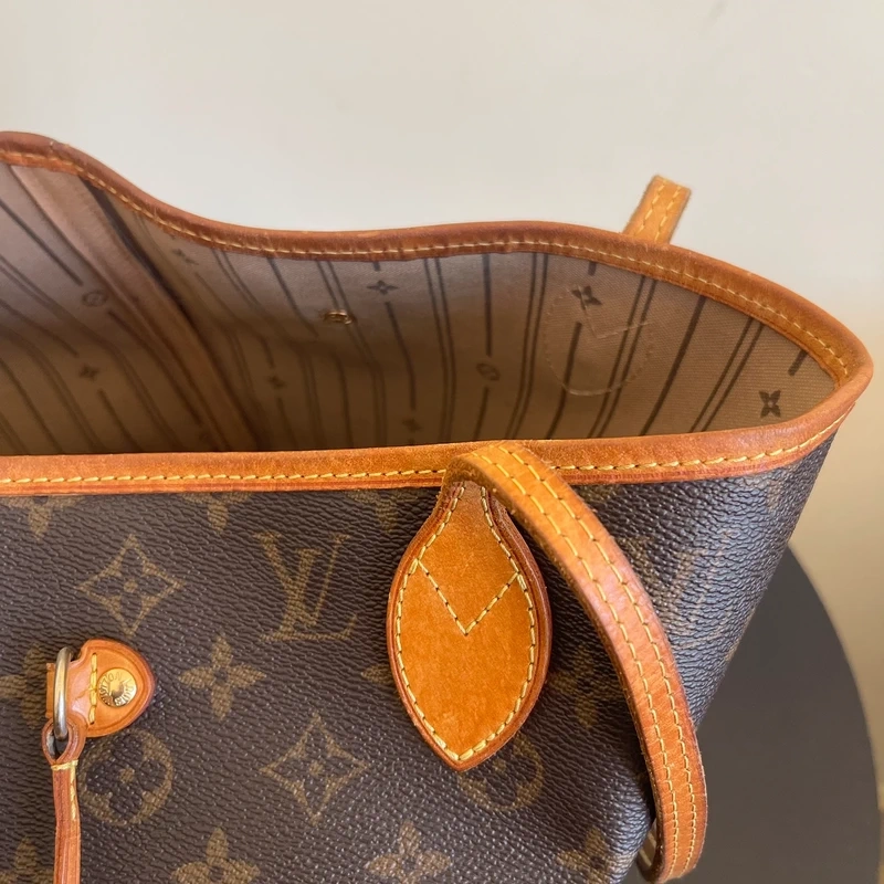 Louis Vuitton neverfull MM monogram SAC DE LUXE LV. LUXE DE SECONDE MAIN AUTHENTIQUE. ENTRUPY CERTIFICATE
