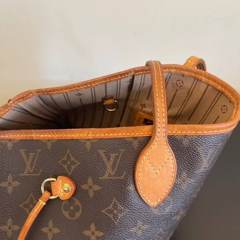 Louis Vuitton neverfull MM monogram SAC DE LUXE LV. LUXE DE SECONDE MAIN AUTHENTIQUE. ENTRUPY CERTIFICATE