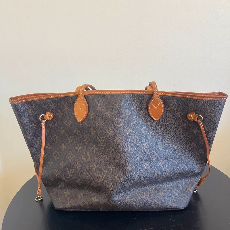 Louis Vuitton neverfull MM monogram SAC DE LUXE LV. LUXE DE SECONDE MAIN AUTHENTIQUE. ENTRUPY CERTIFICATE