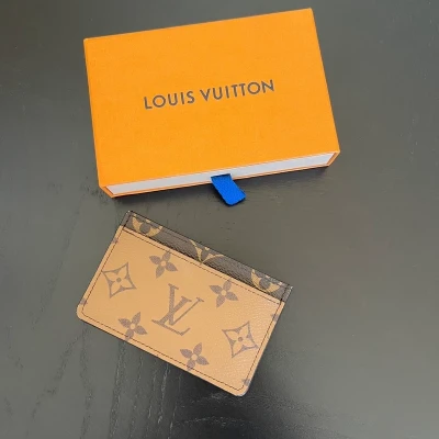 LOUIS VUITTON Porte-Cartes Simple Monogram Reverse SAC DE LUXE LV. LUXE DE SECONDE MAIN AUTHENTIQUE. ENTRUPY CERTIFICATE