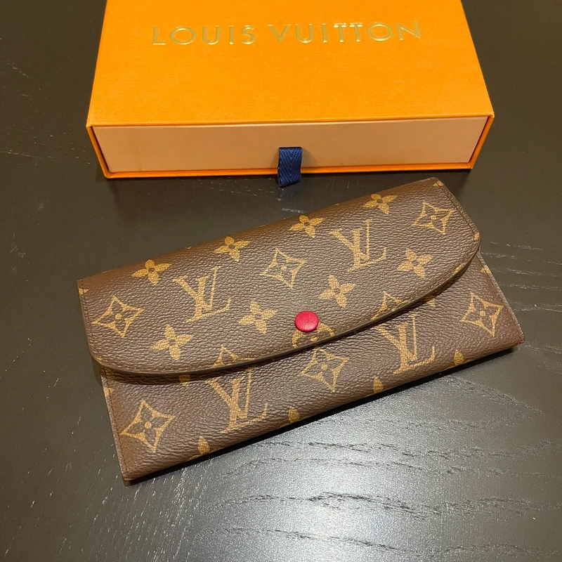 Louis Vuitton Emilie monogram LUXE DE SECONDE MAIN AUTHENTIQUE. PETITE MAROQUINERIE DE LUXE. ENTRUPY CERTIFICATE