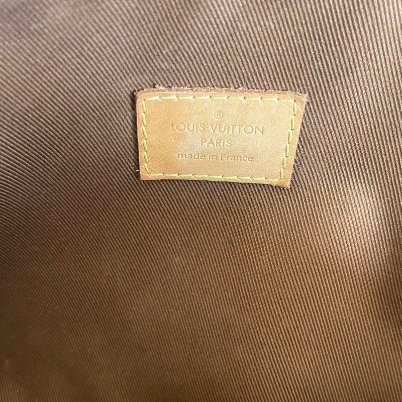 Louis Vuitton étui voyage PM monogram LUXE DE SECONDE MAIN AUTHENTIQUE. PETITE MAROQUINERIE DE LUXE. ENTRUPY CERTIFICATE