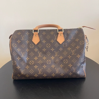Louis Vuitton speedy 35 monogram SAC DE LUXE DE SECONDE MAIN AUTHENTIQUE. PETITE MAROQUINERIE DE LUXE. ENTRUPY CERTIFICATE