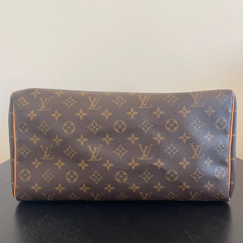 Louis Vuitton speedy 35 monogram SAC DE LUXE DE SECONDE MAIN AUTHENTIQUE. PETITE MAROQUINERIE DE LUXE. ENTRUPY CERTIFICATE