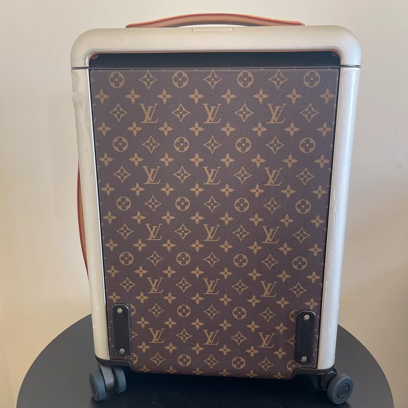 LOUIS VUITTON Horizon 55 LUXE DE SECONDE MAIN AUTHENTIQUE CERTIFICAT D'AUTHENTICITE ENTRUPY. SAC DE LUXE D'OCCASION PAS CHER LOUIS VUITTON FULL SET