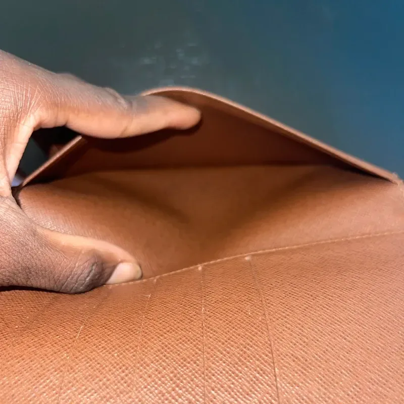 LOUIS VUITTON portefeuille long vintage en toile monogram - détail du produit 10